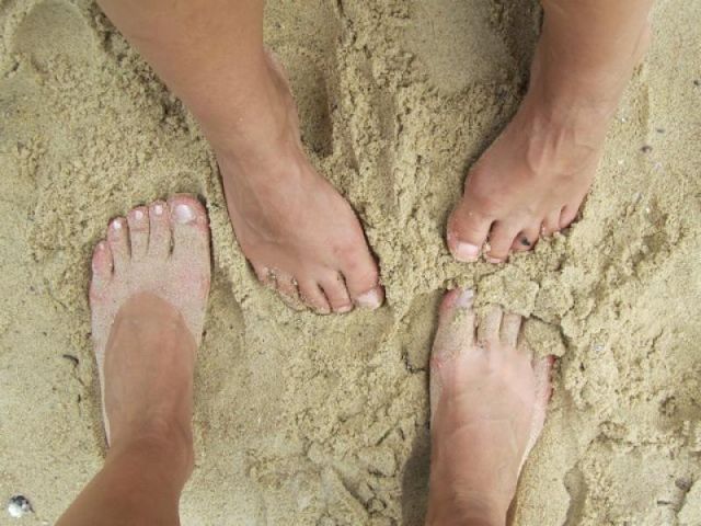 voetjes in het zand
